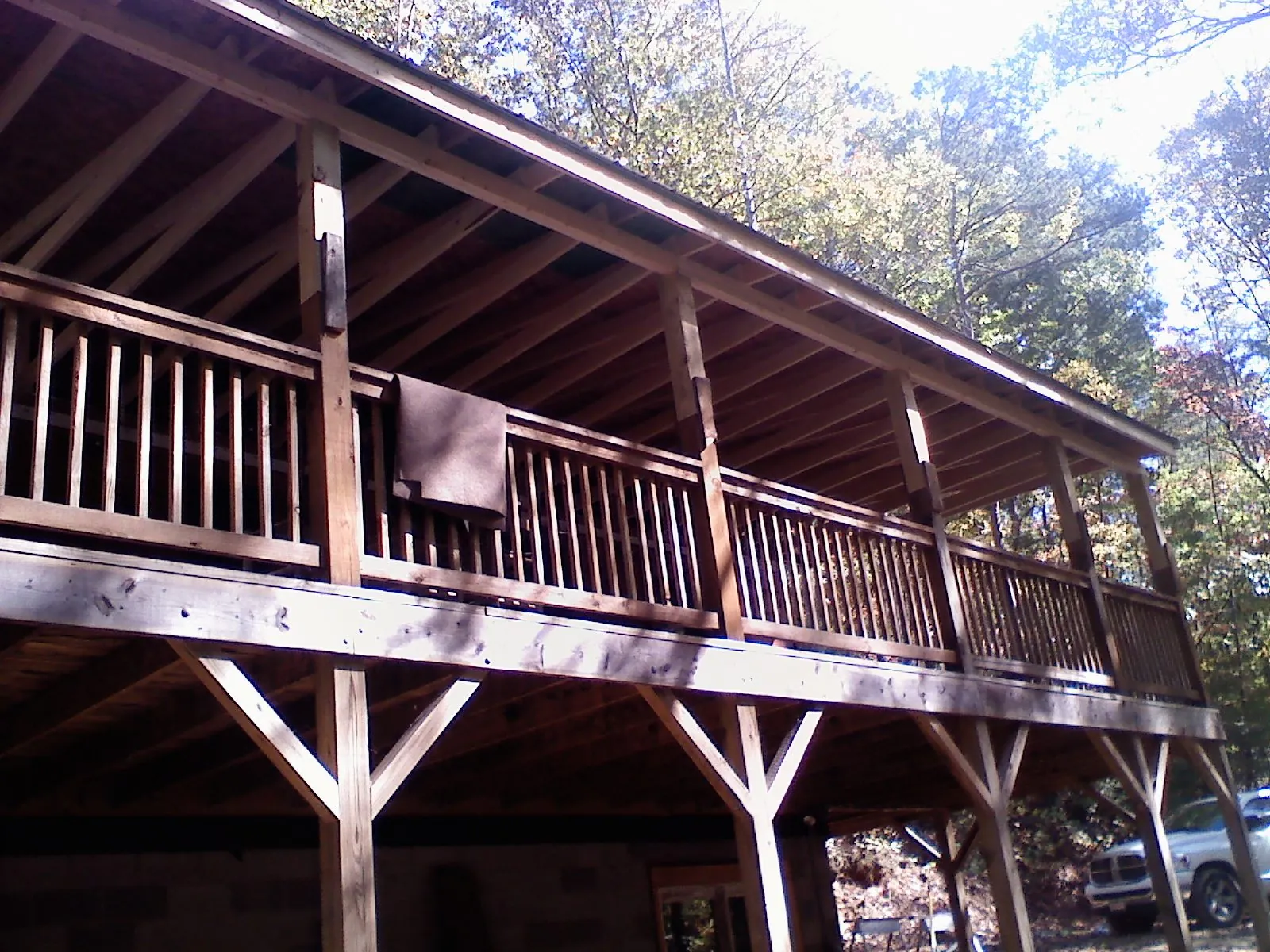 Timber framing under a new elevated porch and deck — Roof Leak Repair in Anaconda by Roofing Brothers
